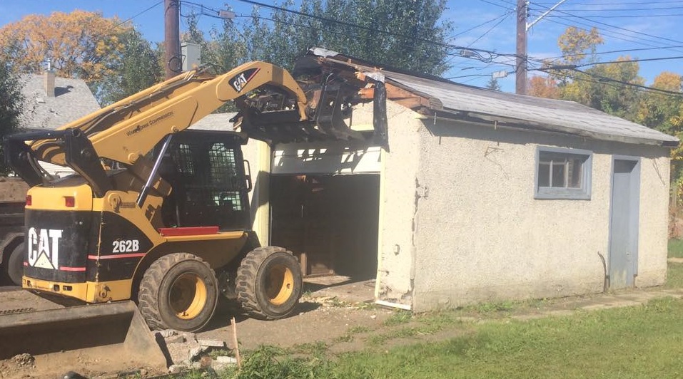Using Our Bobcat During A Garage Demolition In Delaware